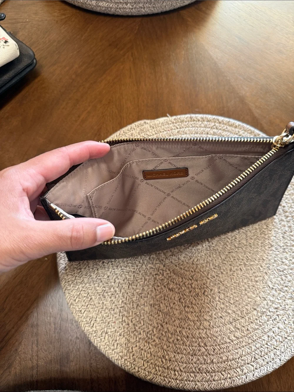 Michael Kors Dark Brown Monogram Wristlet Clutch with Gold Logo